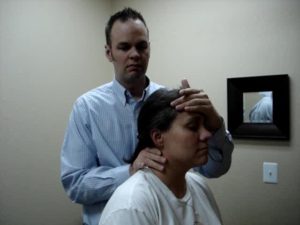 Dr. Ryan Hatch doing a Chiropractic Adjustment Parker CO